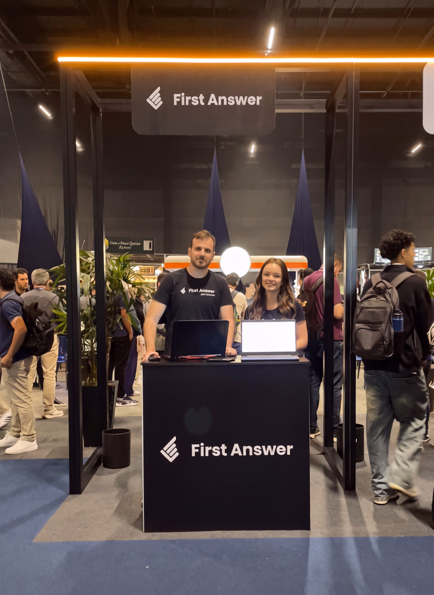 Team at the First Answer booth